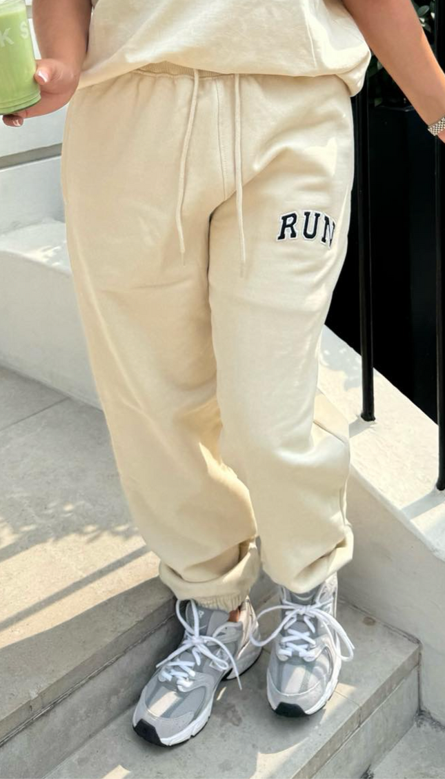 Run Appliqué 100% Cotton Sweatpants Cream