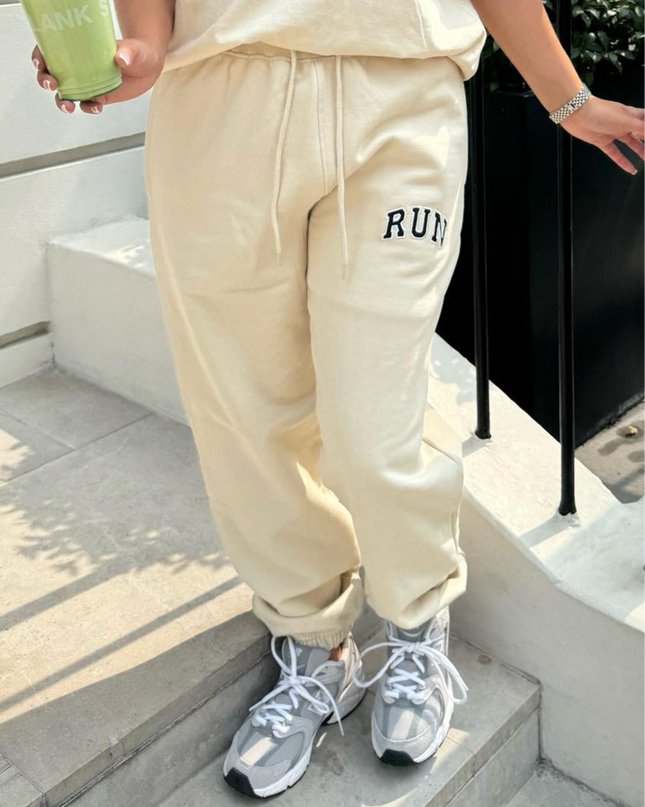 Run Appliqué 100% Cotton Sweatpants Cream