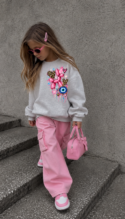 Front of the Bubblegum Dreams kids' sweatshirt in grey marl with a pink balloon dog, leopard hearts and an evil eye on the chest – Miss Runway