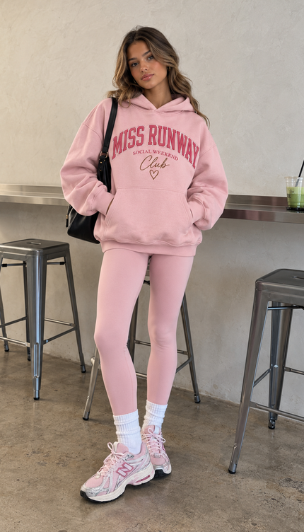 Front of the Pink Getaway kids' hoodie in pink with red collegiate MISS RUNWAY lettering with club script – Miss Runway