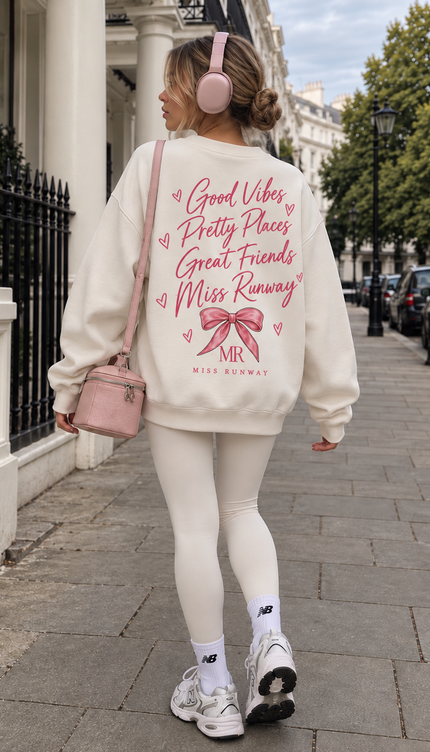 Back of the Social Weekend kids' sweatshirt in cream with pink script reading Good Vibes, Pretty Places, Great Friends, Miss Runway above a pink bow – Miss Runway