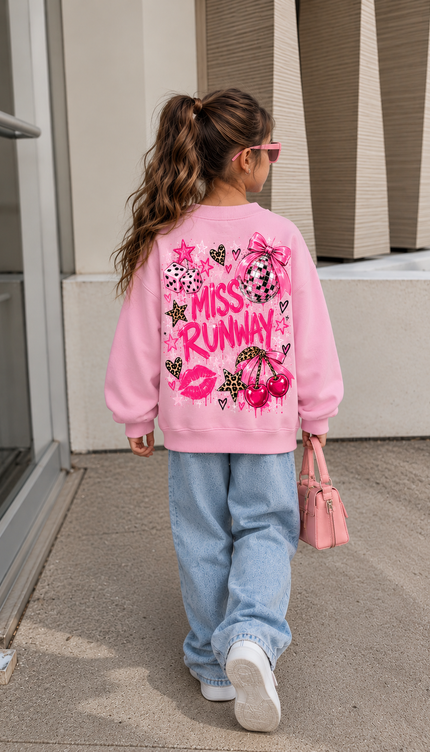 Back of the Pink Cherry Sparkle kids' sweatshirt in pink with hot pink MISS RUNWAY lettering with disco balls, leopard hearts, lips, leopard cherries, stars and a bow – Miss Runway