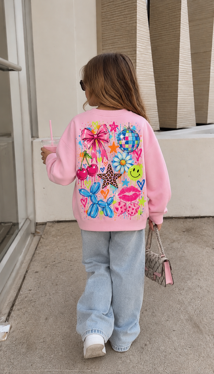 Back of the Disco Daisy kids' sweatshirt in pink with a pink bow, a disco ball, a daisy, cherries, a leopard star, a smiley, a blue balloon dog and lips – Miss Runway