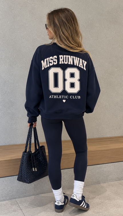 Back of the Miss Runway Athletic Club kids' sweatshirt in navy with cream MISS RUNWAY lettering with a varsity number 08 and Athletic Club – Miss Runway