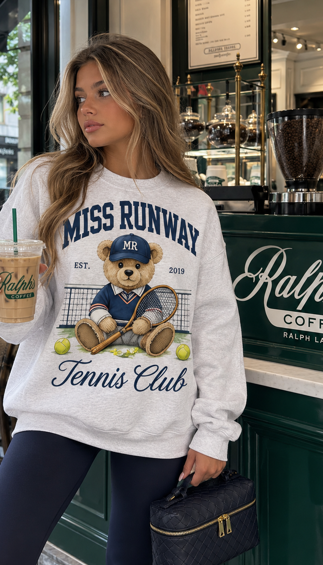 Front of the Miss Runway Tennis Club kids' sweatshirt in grey with a navy teddy bear tennis print