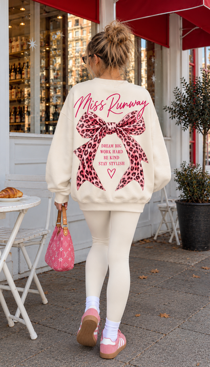 Back of the Cherry Bow Club kids' sweatshirt in cream with Miss Runway script above a large pink leopard print bow – Miss Runway