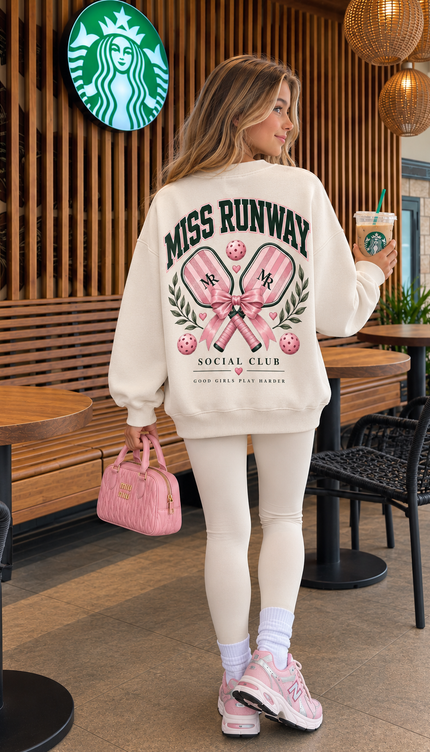 Back of the Preppy Social Club kids' sweatshirt in cream with crossed paddles tied with a pink bow, finished with Social Club – Miss Runway