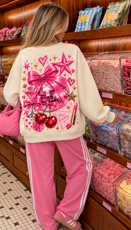Back of the Cherry Crush Bow kids' sweatshirt in cream with an oversized pink bow, disco ball and cherries