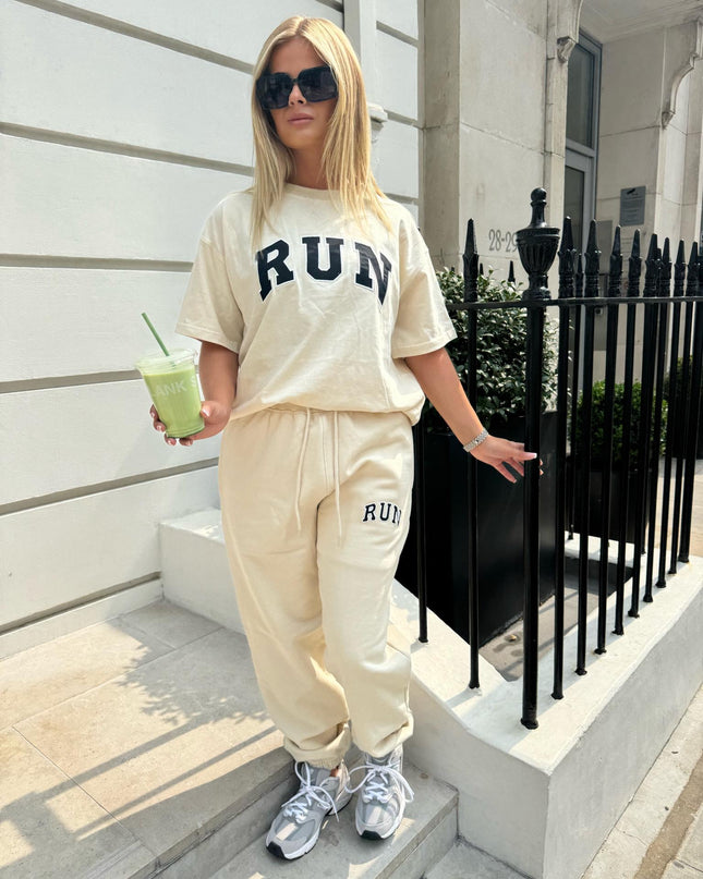 Run Appliqué 100% Cotton Sweatpants Cream