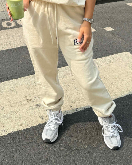 Ecru Run Appliqué Sweatpants